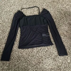 Black sheer top with strap around the neck. NEVER WORN!